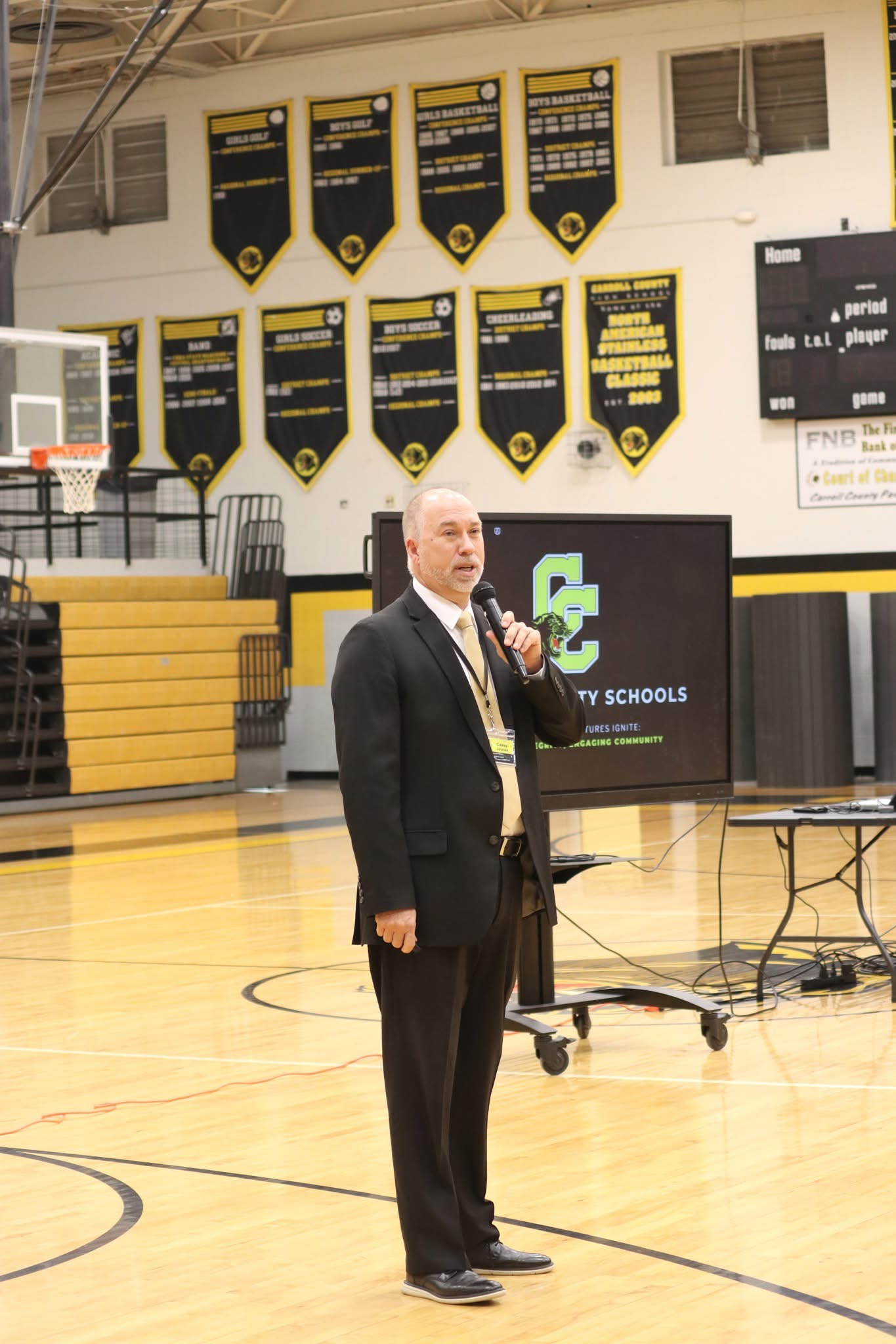Casey Jaynes speaking at a Carroll County Schools community event