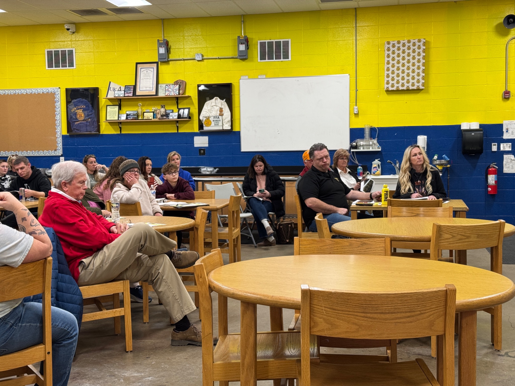 Casey Jaynes listening during a school and community forum