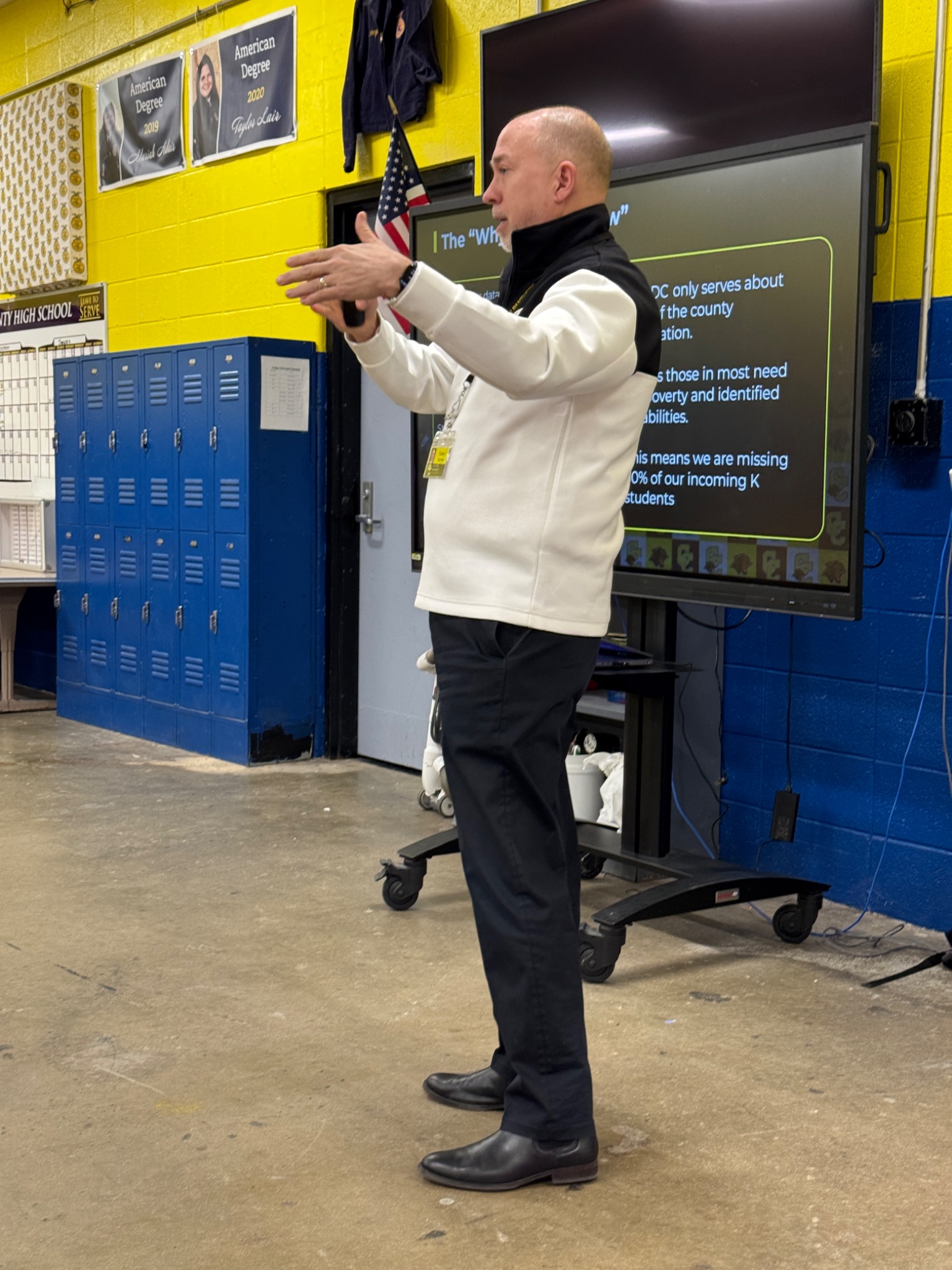 Casey Jaynes presenting to families and community members
